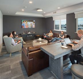 Los Angeles apartment for rent - A group of people are sitting in a modern lounge area.
