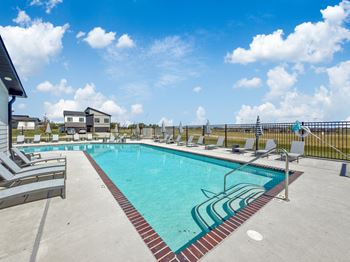 Our apartments have a resort style pool with lounge chairs