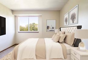 Newton apartment for rent - A bedroom with a large bed and a window showing trees outside at Hunters Run Apartments, Newton, Iowa