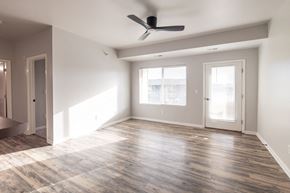Grimes apartment for rent - An empty living room at Meadowlark Place Apartments, Grimes, IA