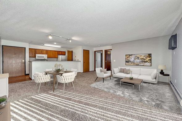 Sioux Falls apartment for rent - a living room with a couch and a table at Autumn Park, Sioux Falls, SD
