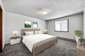 Sioux Falls apartment for rent - a bedroom with a bed and a window at Autumn Park, Sioux Falls, 57106  