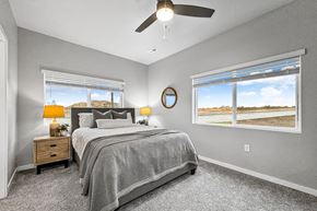 Waukee apartment for rent - a bedroom with a bed and a ceiling fan at Converge NW, Waukee, 50263  