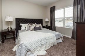 Clive apartment for rent - a bedroom with a bed and a window at Stonegate Crossing Apartments, IOWA, 50325