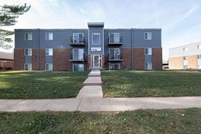 Ankeny apartment for rent - A large apartment complex with a grassy front yard at Lake Shore Place Apartments, Ankeny, IA,  50021