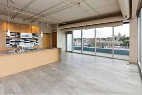 Des Moines apartment for rent - A spacious kitchen with a view of the city.at City Square Lofts, Des Moines  