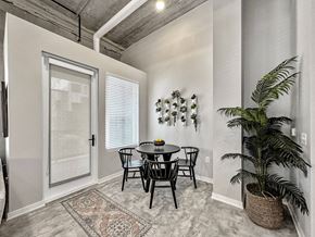 Des Moines apartment for rent - A dining room with a table and chairs.at Level, Iowa