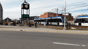Waterloo apartment for rent - A clock tower stands in front of a bus station.