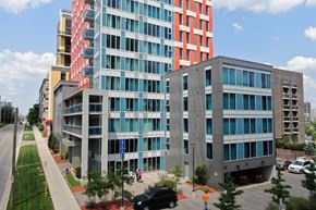 Waterloo apartment for rent - an aerial view of two modern buildings on a city street