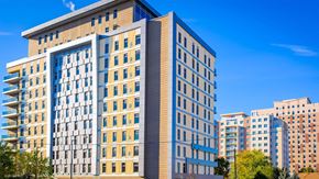 Waterloo apartment for rent - a large apartment building with a blue sky in the background