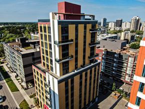 Waterloo apartment for rent - a tall building with a city in the background