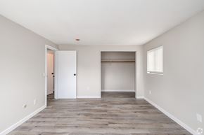 New York Mills apartment for rent - A room with a white door and a window with blinds.