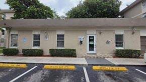 Hialeah apartment for rent - A building with a sign that says "OFFICIAL BAN SPN" on the front.