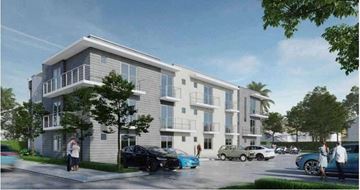 Hialeah apartment for rent - a rendering of a building with cars parked in front of it