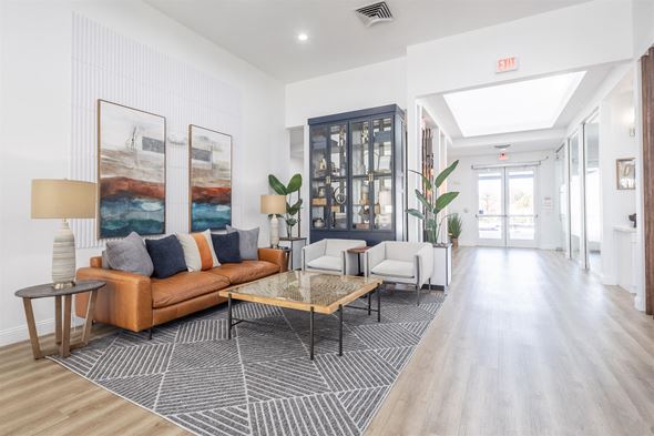 New Port Richey apartment for rent - a living room with a leather couch and a coffee table