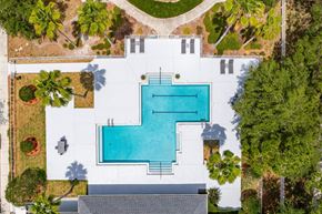 New Port Richey apartment for rent - arial view of a pool on the roof of a house