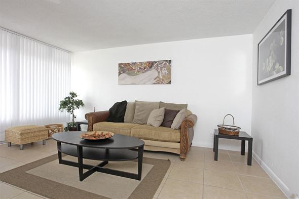 Oakland Park apartment for rent - a living room with a couch and a coffee table