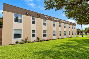 Miami apartment for rent - A building with the words South Pointe Apartments on it.