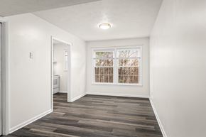 Verona apartment for rent - A room with a window and a wooden floor.