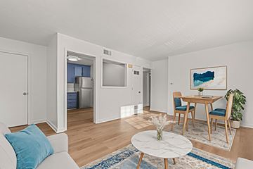 Waynesboro apartment for rent - A living room with a white couch and a round marble coffee table.