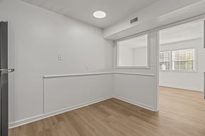 Waynesboro apartment for rent - A room with white walls and wooden flooring.