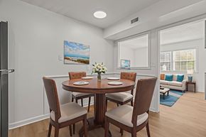 Waynesboro apartment for rent - A dining room with a table set for two and a painting on the wall.