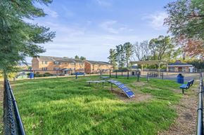 Waynesboro apartment for rent - A park with a playground and a building in the background.
