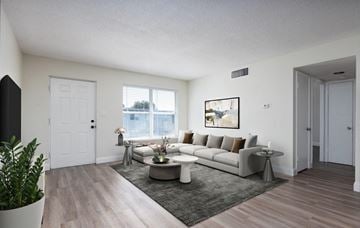 Titusville apartment for rent - our apartments offer a living room with a couch and a coffee table