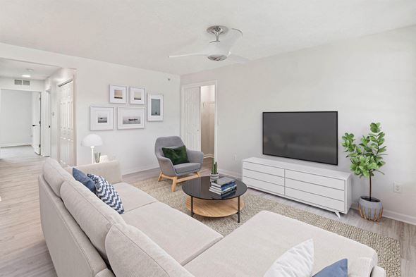 Brockport apartment for rent - a living room with a couch and a tv