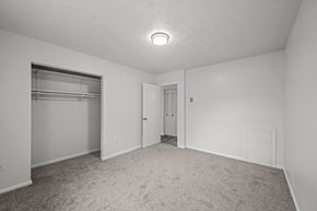 Staunton apartment for rent - A sparsely furnished room with a closet and a door.