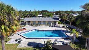 Merritt Island apartment for rent - A house with a pool in the backyard.