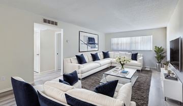 Merritt Island apartment for rent - A living room with a white couch and a coffee table.