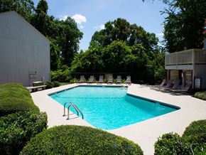 Macon apartment for rent - a swimming pool is next to a building
