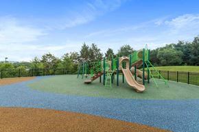Dulles apartment for rent - A playground with a slide and plenty of fenced in space.
