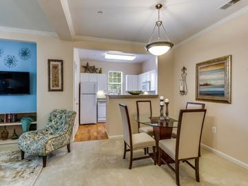 Dulles apartment for rent - a living room and dining room with a table and chairs
