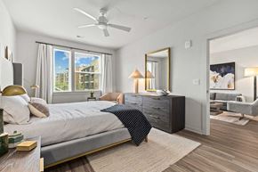 Germantown apartment for rent - a bedroom with a bed and a ceiling fan