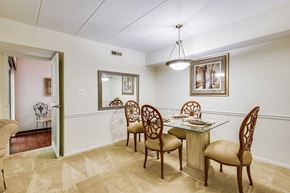 Reston apartment for rent - a dining room with a table and chairs