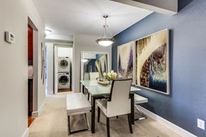 Alexandria apartment for rent - A dining room with a table and chairs.