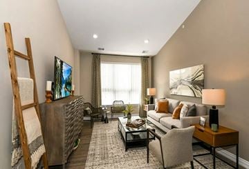 Novi apartment for rent - a living room with a couch and a table