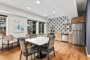 Kent apartment for rent - Dining And Kitchen at Ovation at Meeker 55+ Senior Apartments, Washington, 98032