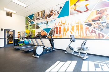 24-Hour fitness studio with cardio & free weights