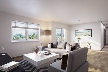 Everett apartment for rent - a living room with a gray couch and a white coffee table
