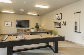 Game room with billiards table