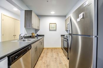Fully equipped gourmet kitchen with microwave and dishwasher