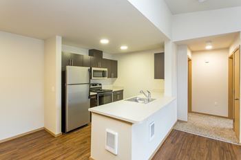 Fully equipped kitchen with microwave, refrigerator, dishwasher and usb outlet