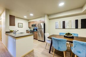 Auburn apartment for rent - a kitchen and dining room with a table and chairs