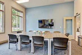 Auburn apartment for rent - a conference room with a large table and chairs