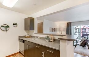 Bothell apartment for rent - a kitchen with stainless steel counter tops and a large window