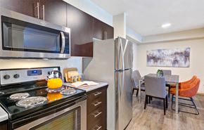 Redmond apartment for rent - a kitchen with stainless steel appliances and a stainless steel refrigerator