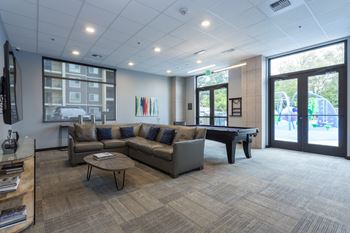 Game room and lounge with billiards table